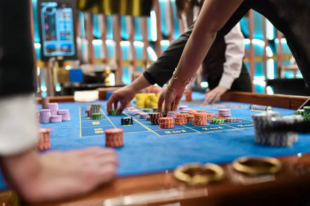 Playing cards and chips on velvet surface